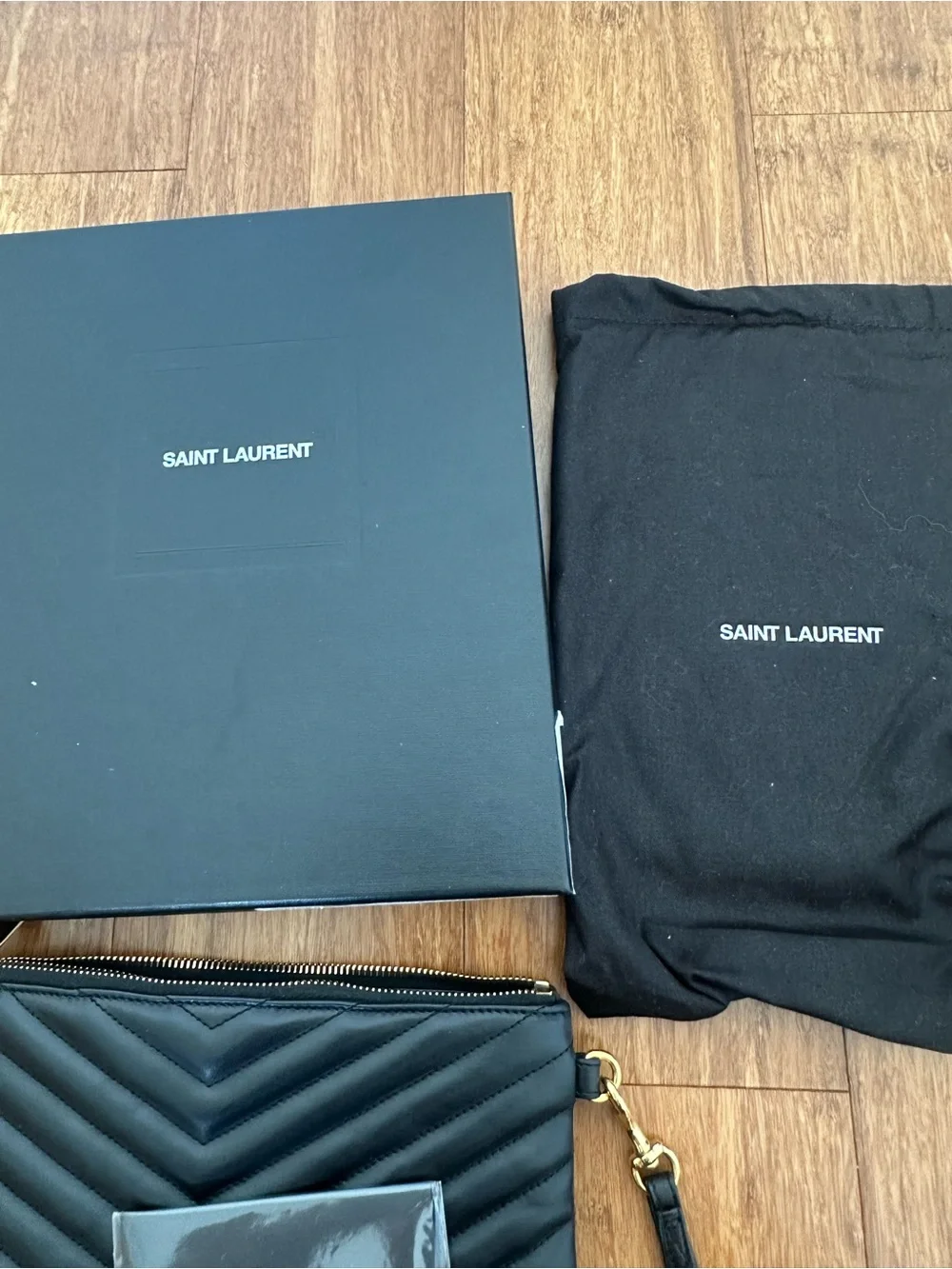 Saint Laurent Black Quilted Leather Wristlet with Gold YSL Emblem
